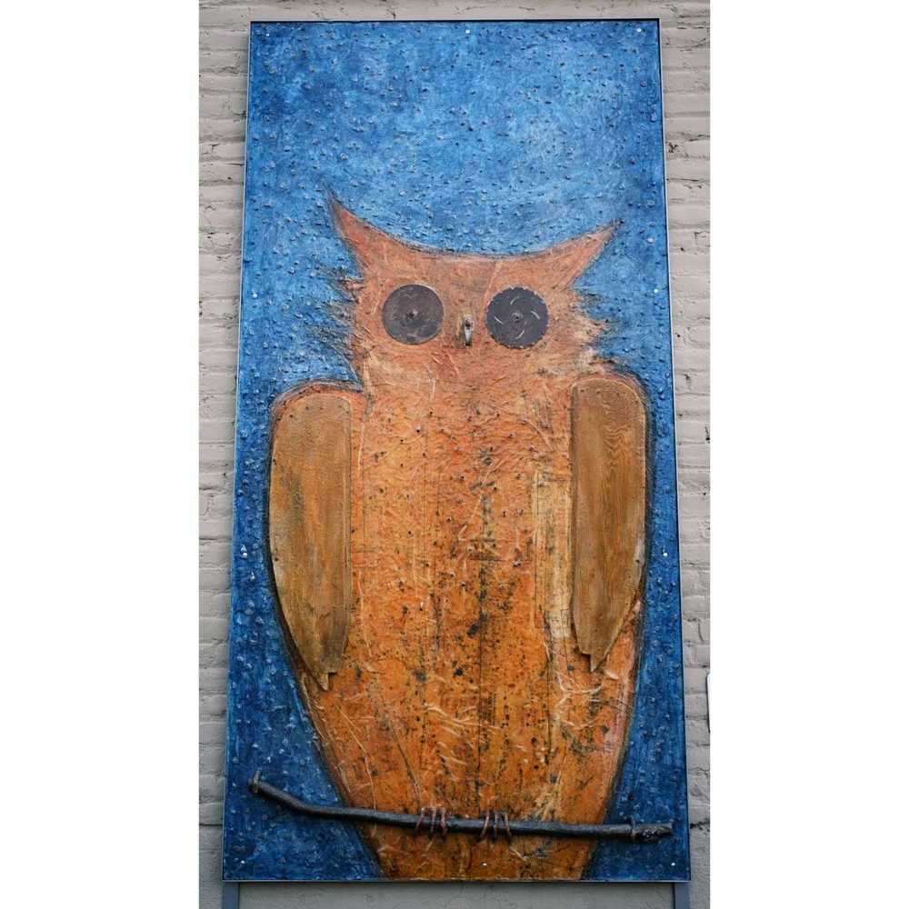 Steet art with owl painting in downtown Bend, Oregon