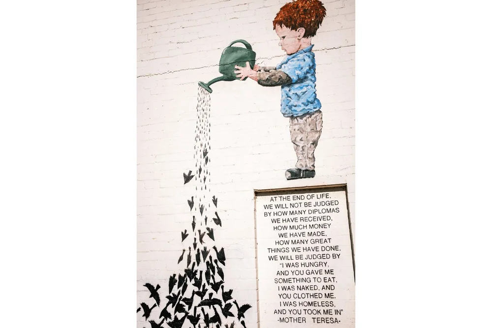 Phoenix downtown Roosevelt Row mural the garden closeup of boy and text by mother teresa
