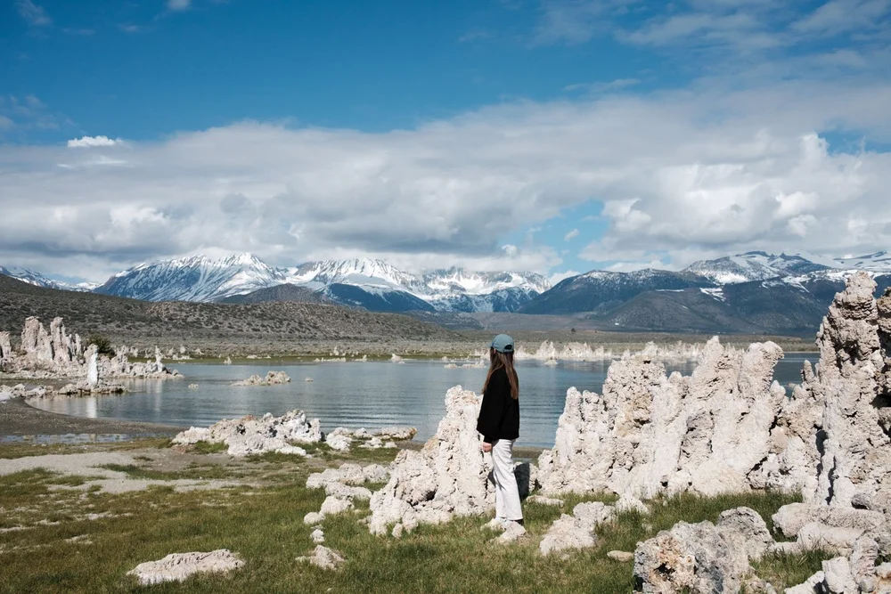 Mono Lake, California, posing by tufa formations looking over to snowy peaks