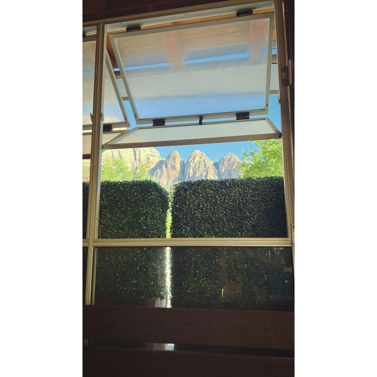 Zion Canyon mountains through Oscar's Cafe window