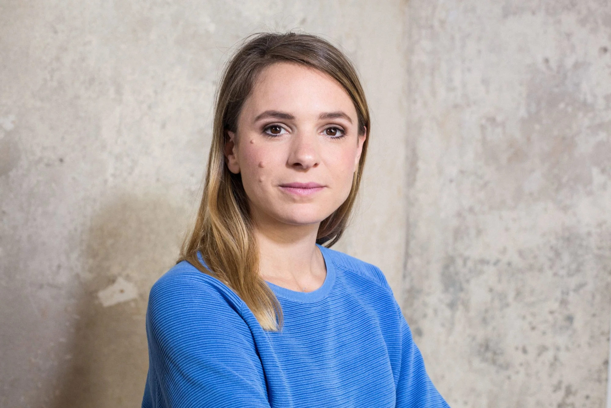 Dr. Julia Rummel, Coach und Neurowissenschaftlerin, lächelnd