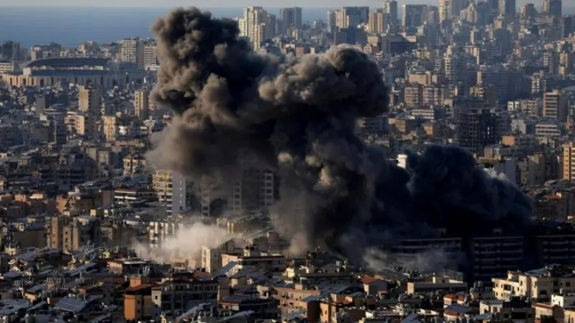 Smoke from an airstrike rises over Beirut, March 26