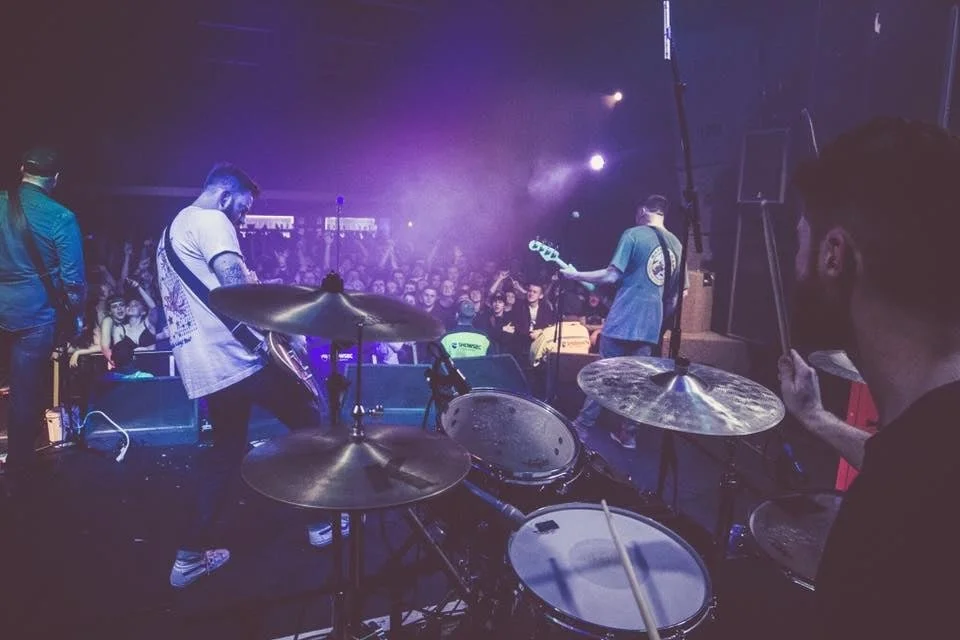Performing with Four Year Strong in Manchester, England in 2017. My first time playing to a room of 1,000 people.