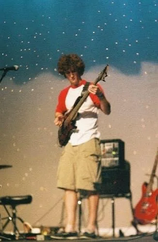 Looping drums, bass, and guitar at a high school talent show, 2007