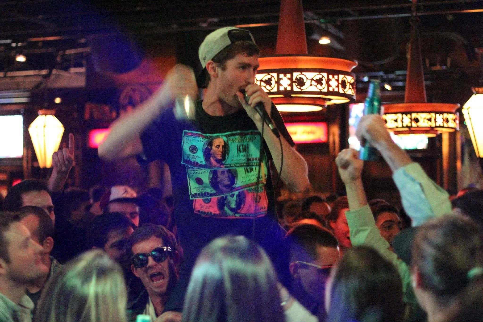 Crowdsurfing while singing Sweet Caroline at The Lansdowne Pub in Boston, 2012