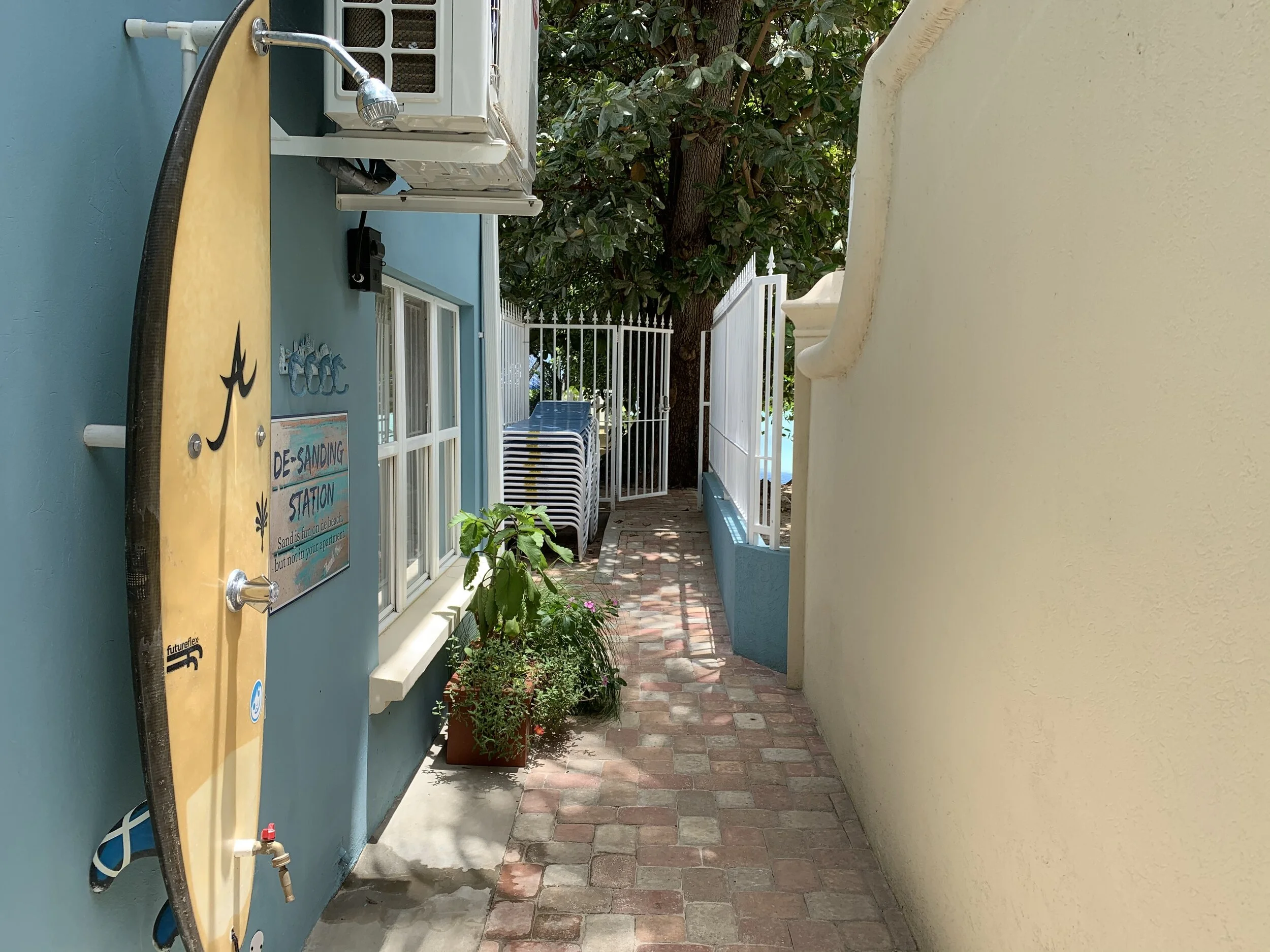 The private beach access and surf board beach shower
