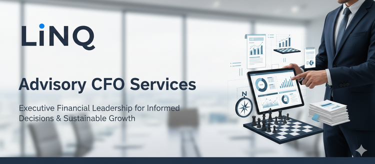 Business advisor reviewing financial charts and reports on a tablet for LiNQ Ventures fractional CFO services