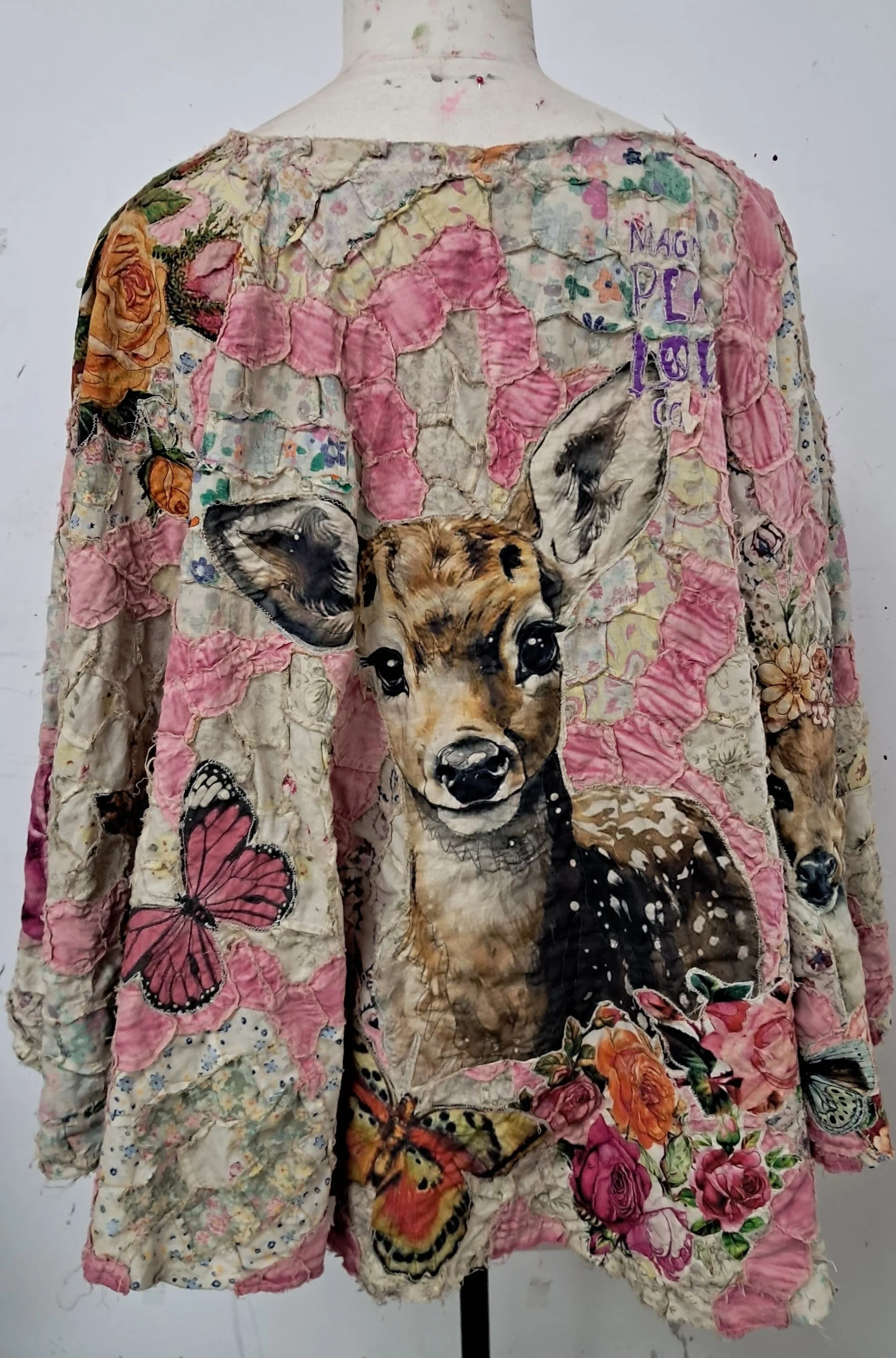 deer-quilted-poncho-bk.jpeg