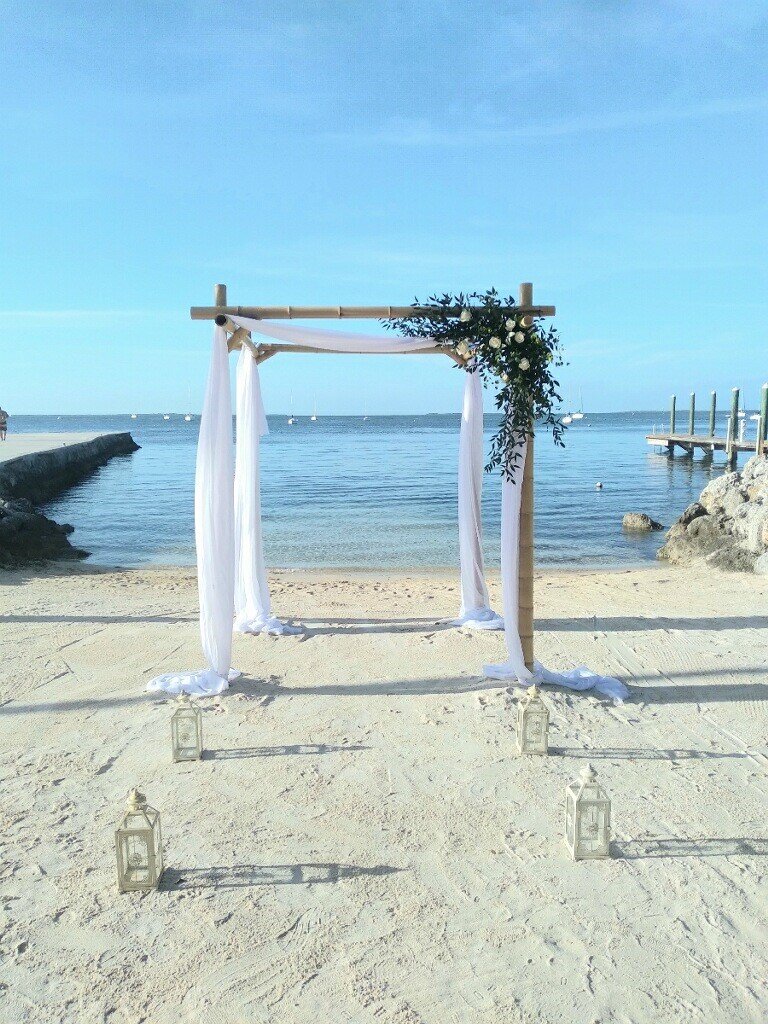 Elopement with bamboo arch Oasis Beach