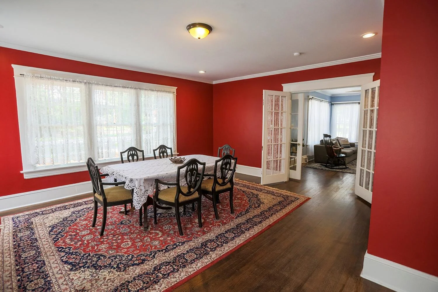 My favorite room in the house.  So glad our realtor said the red walls could stay.
