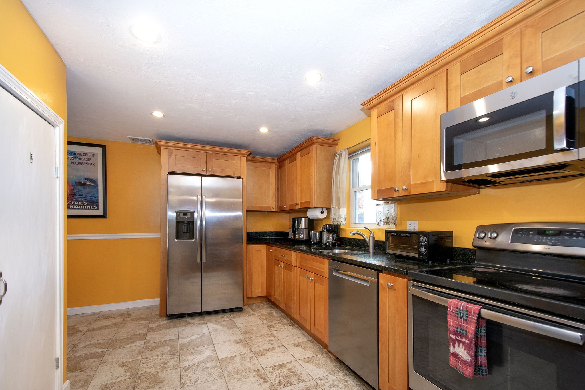 Kitchen  with granite and stainless appliances