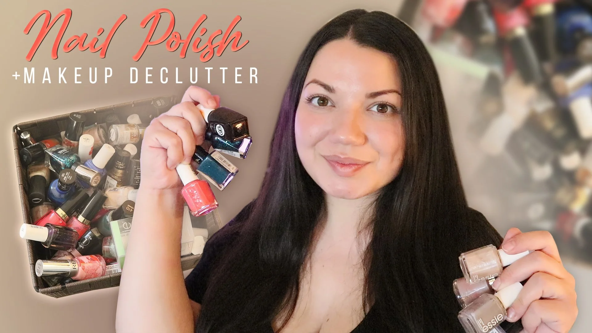 A woman with long dark hair holding multiple bottles of nail polish in her hand, with a large open box behind her filled with various bottles of nail polish. The woman is smiling at the camera, and the background appears to have a collection of addit