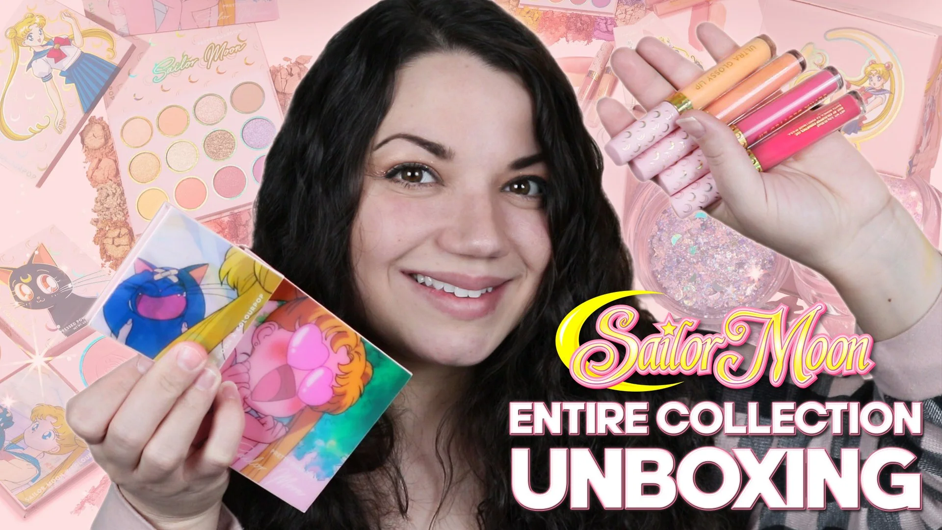 A smiling woman holding Sailor Moon merchandise, including a card and lip glosses, with Sailor Moon makeup palettes and collectibles in the background, and text reading "Sailor Moon Entire Collection Unboxing."