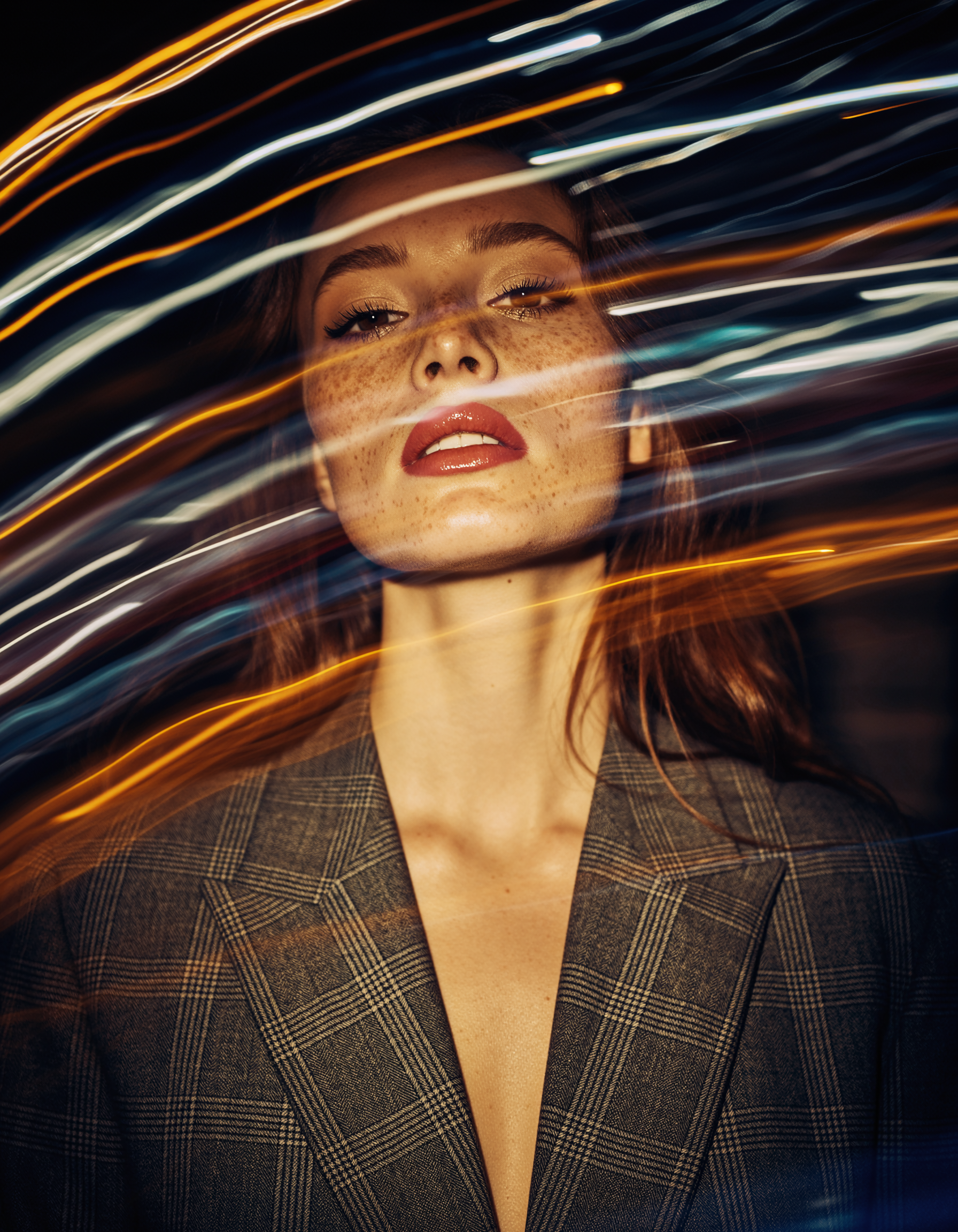 Firefly_Fashion editorial portrait of a woman in a tailored suit at night in the city. Soft s 369021.png