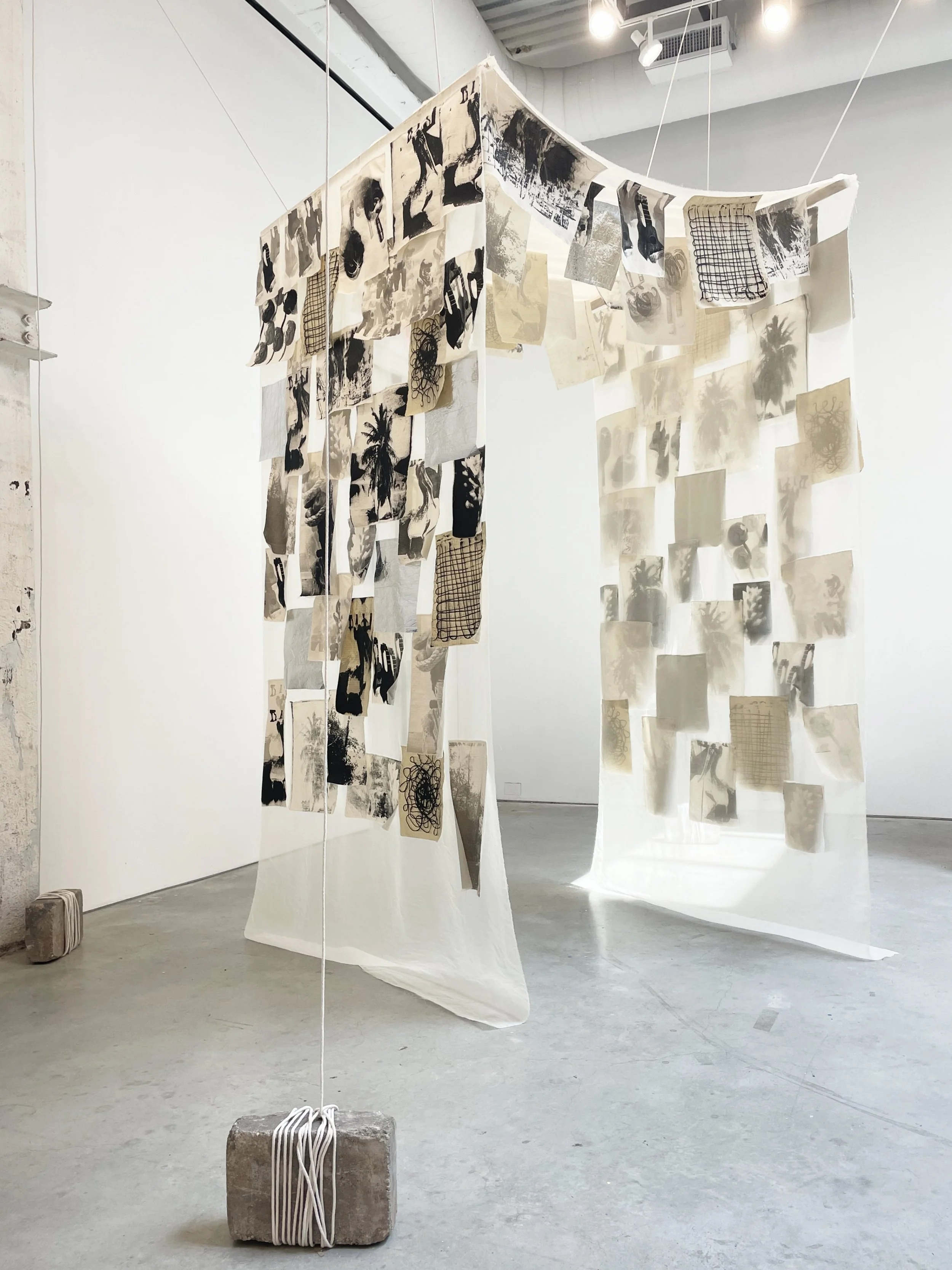   Memoryscape   2025  Screen printed textiles, emergency foil blankets, organza, foil thread, sand blocks, rope 