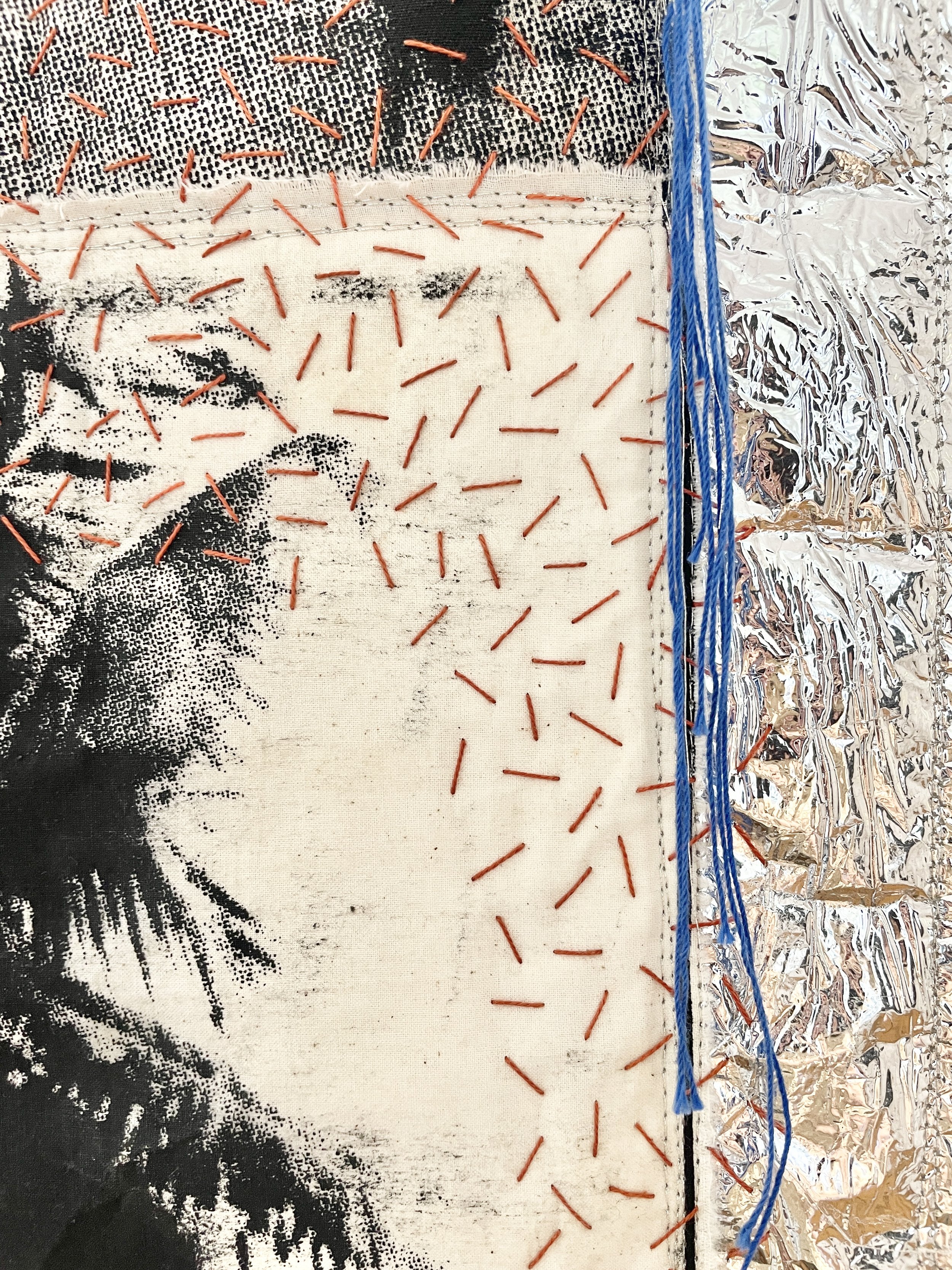   The myth of return (detail)   2025  Screen printed textiles, emergency foil blankets, foil thread, cotton floss 
