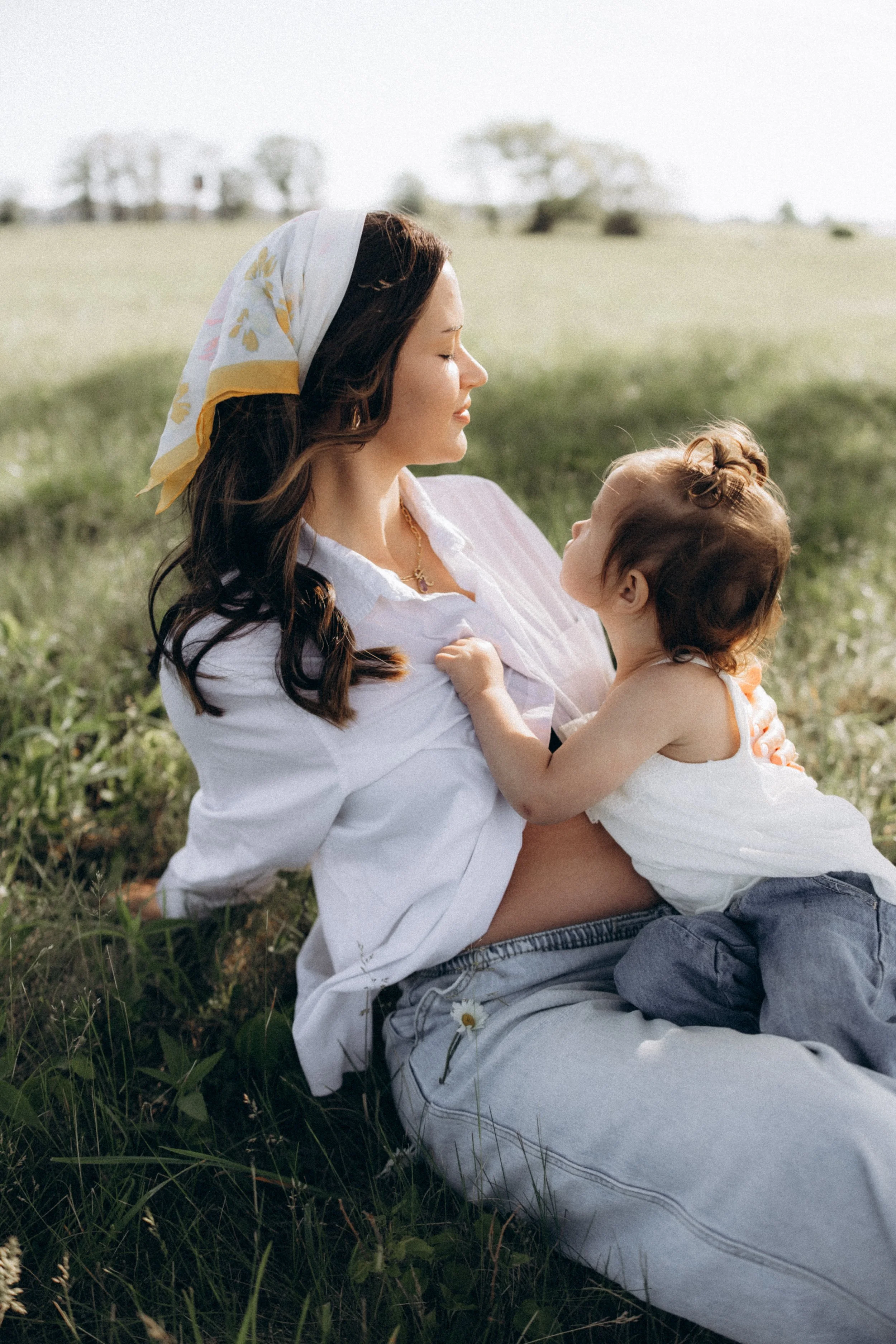 Mother cuddling toddler family session morning in Springfield, Missouri