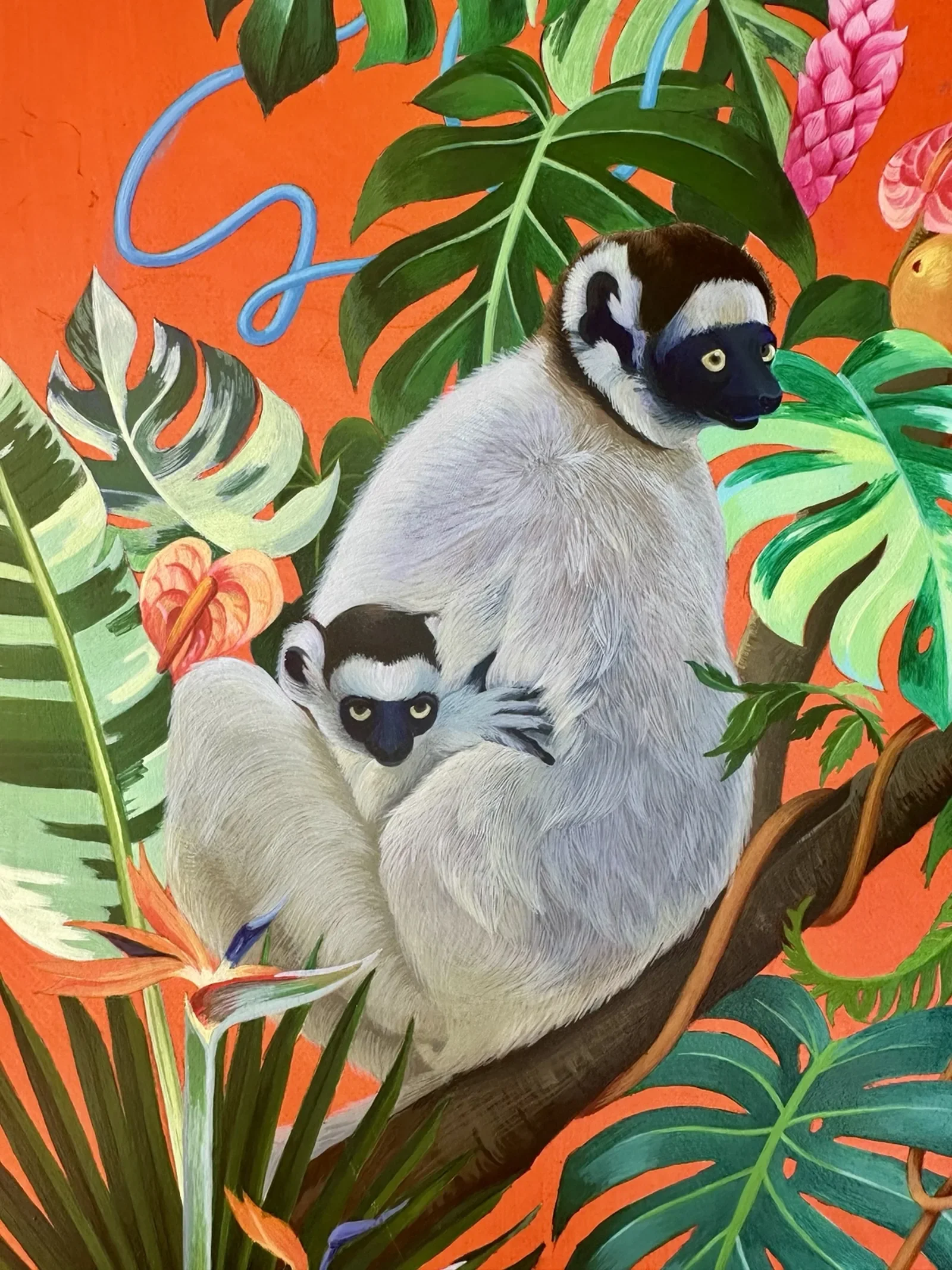 Surreal tropical painting by Haruko Mori featuring two lemurs nestled among lush monstera leaves and exotic flowers against a glowing orange background.