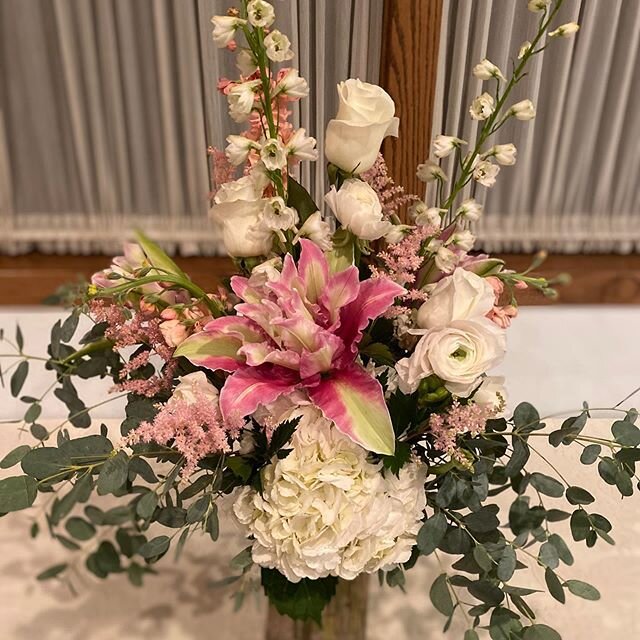 Iowa Grown Rose Lilies and white delphiniums with blush Ranunculus are just gorgeous! #roselilies #whitedelphinium #blushranunculus  #gunnieucalyptus #lovethisonealot #iowaflorist