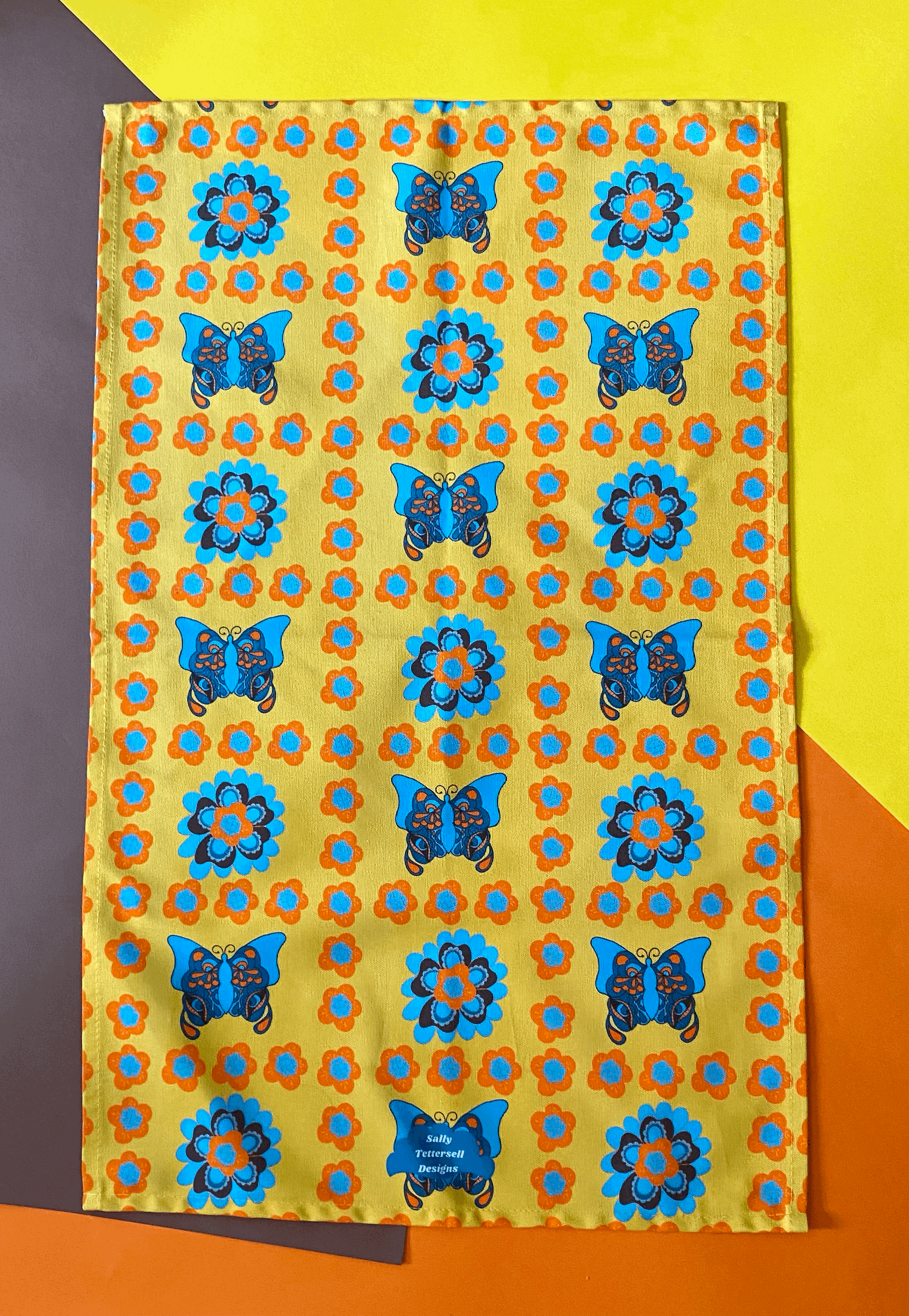 Sally Tettersell Designs Summer of love Butterfly flower patch work, 1970's, retro inspired Tea Towel