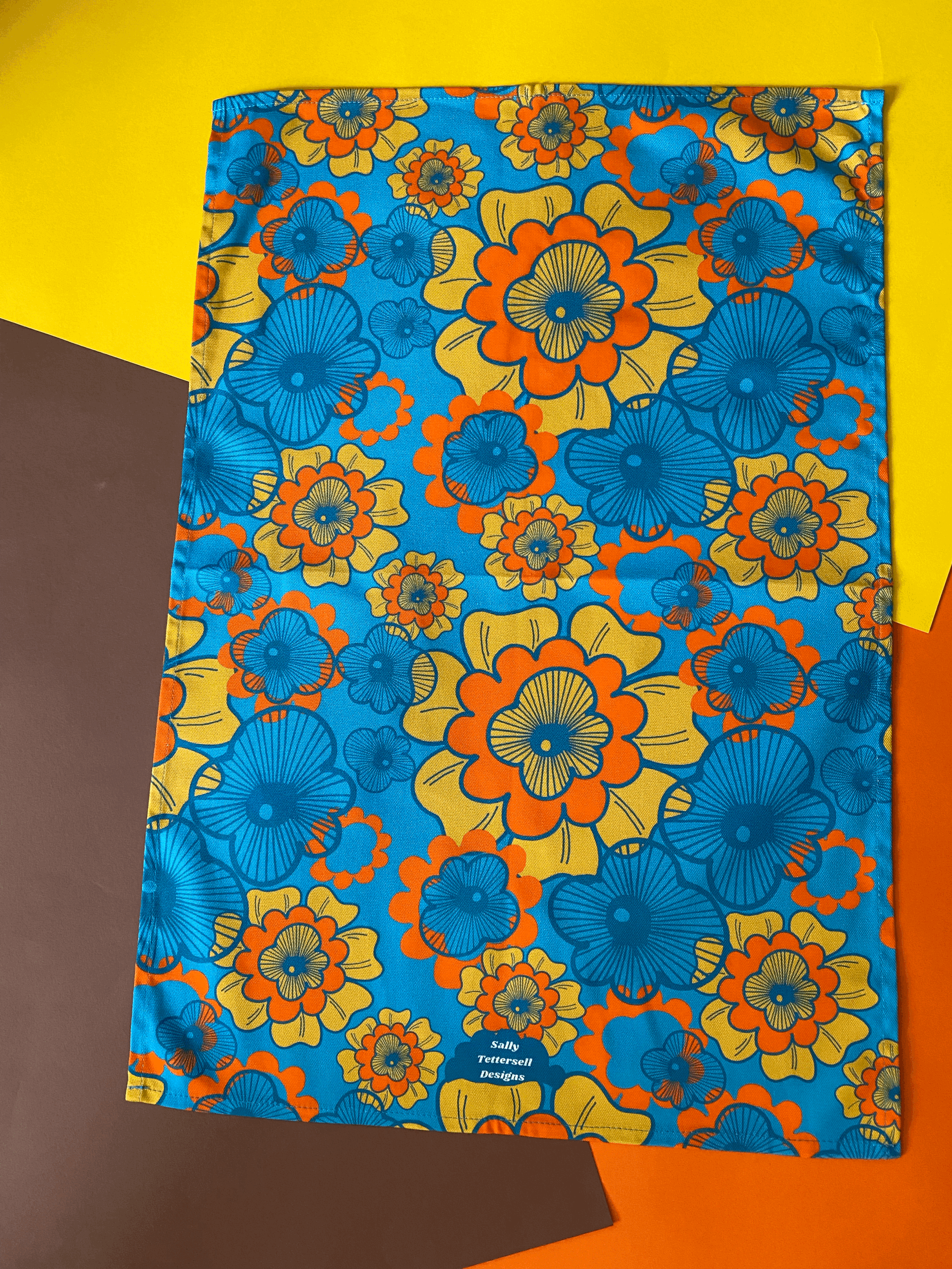 Sally Tettersell Designs Summer of love flower power retro 1970's inspired Tea Towel