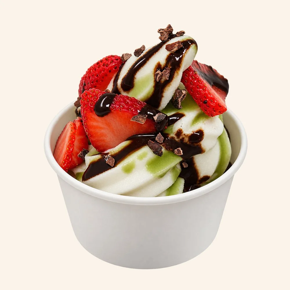 DUBAI CHOCO STRAWBERRY - Maple cinnamon organic soft serve, topped with housemade dark chocolate, strawberry, cacao nib, pistachio oil with a matcha drizzle.