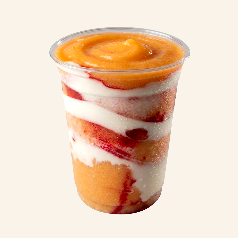 SUMMER GLOW - Organic coconut water, coconut milk, pitaya, turmeric, ginger, peach, strawberry, mango, organic agave, and Cymbiotika tangerine vanilla creatine. 