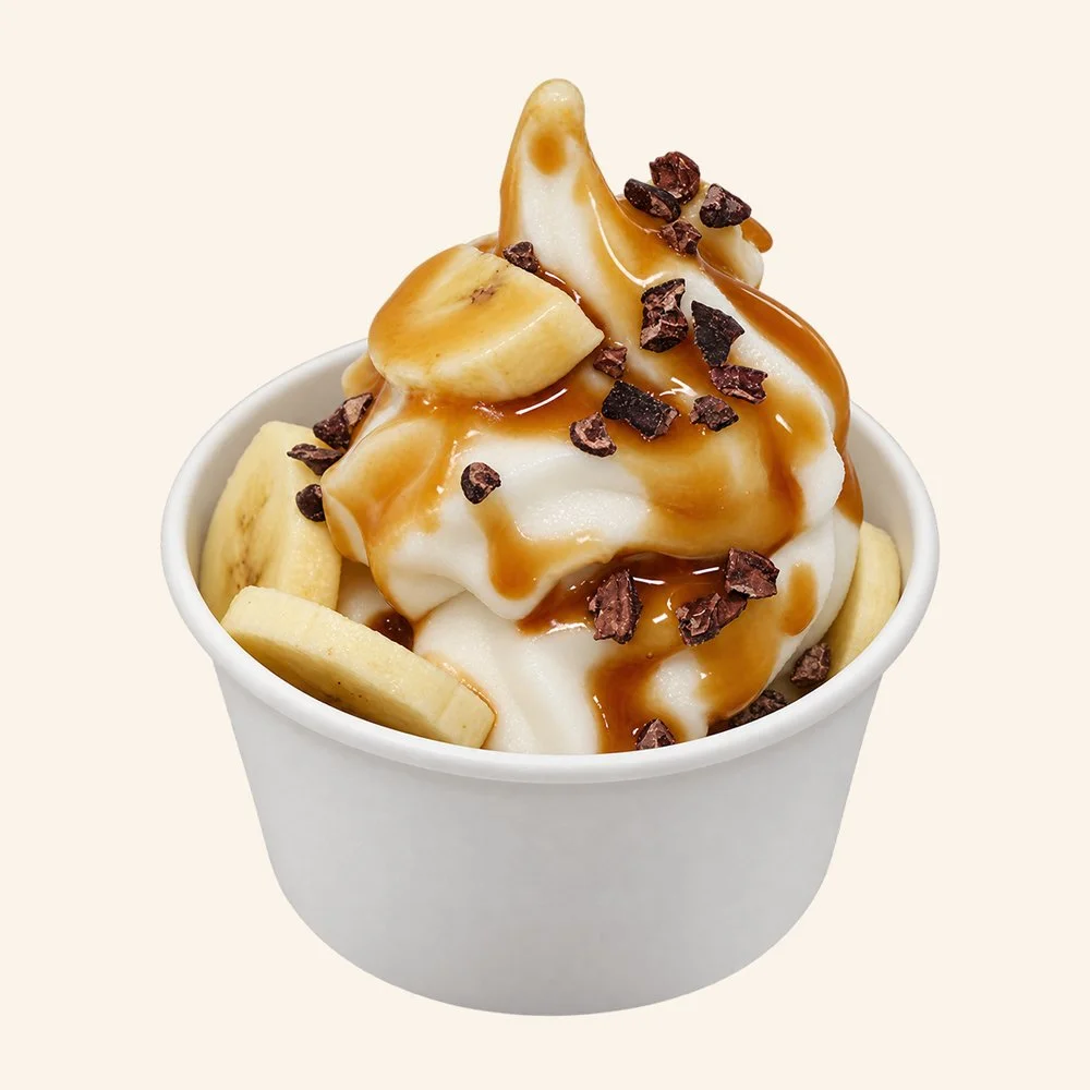 CINNAMON BANANA AFFOGATO - Maple cinnamon organic soft serve, banana, cacao nibs, with an espresso glaze.