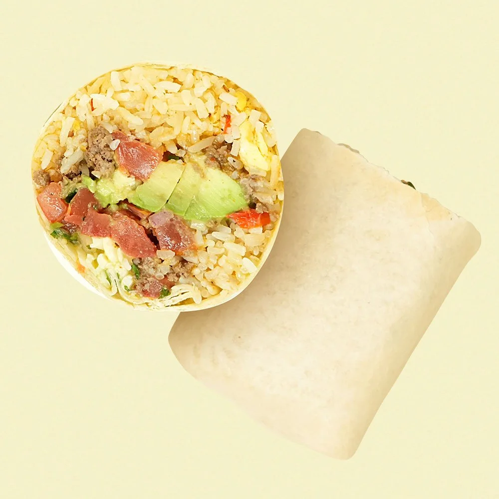 Mexicali Burrito - Grass-fed ground beef, rice, bell peppers, onion, scrambled eggs, cheese blend, salsa verde, avocado & housemade pico de gallo in a flour wrap. Contains Gluten