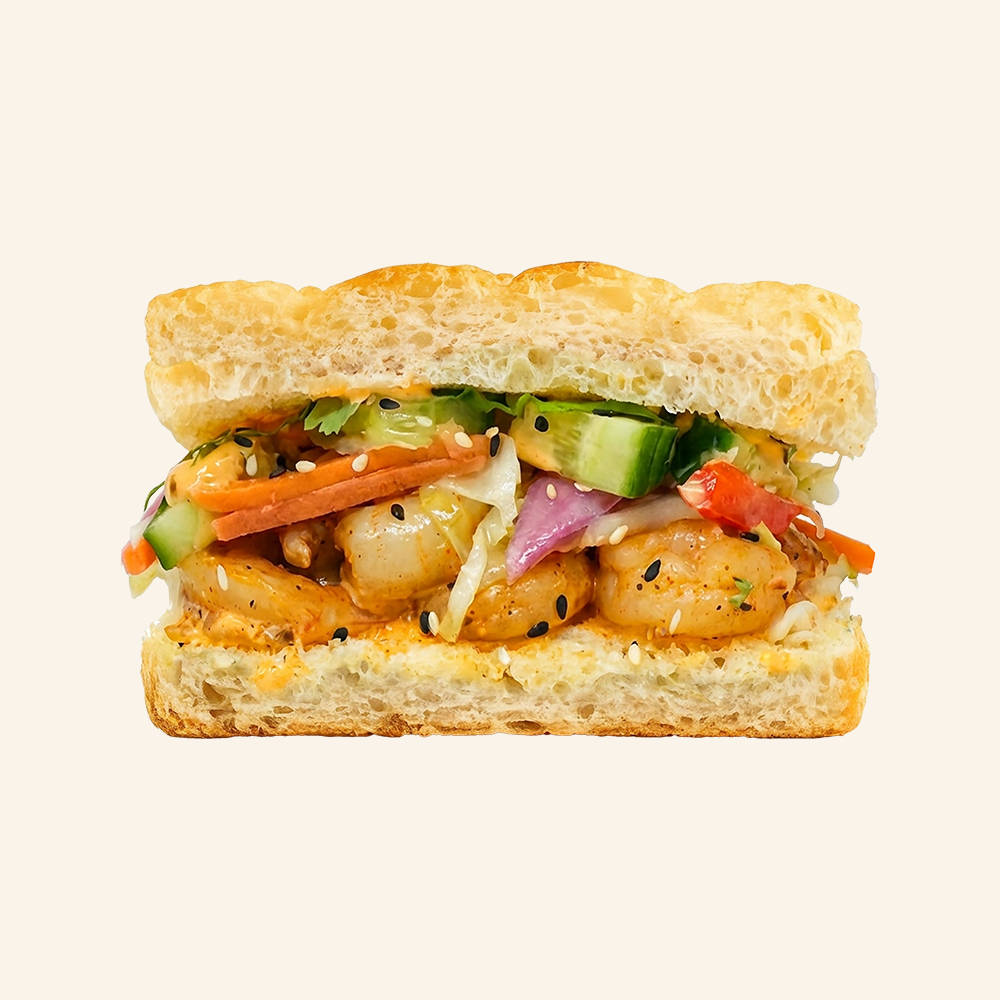 SHRIMP BAHN MI - Blackened shrimp, candied jalapenos, pickled carrots, onions and veg, cucumbers, cilantro, sesame seeds, Korean aioli
on housemade organic focaccia. $16
