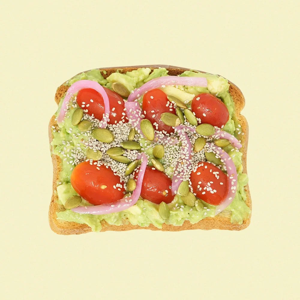 Avocado Toast - Two pieces of Udi’s gluten free bread, mashed avocado, pickled onions, tomato, pumpkin & chia seeds