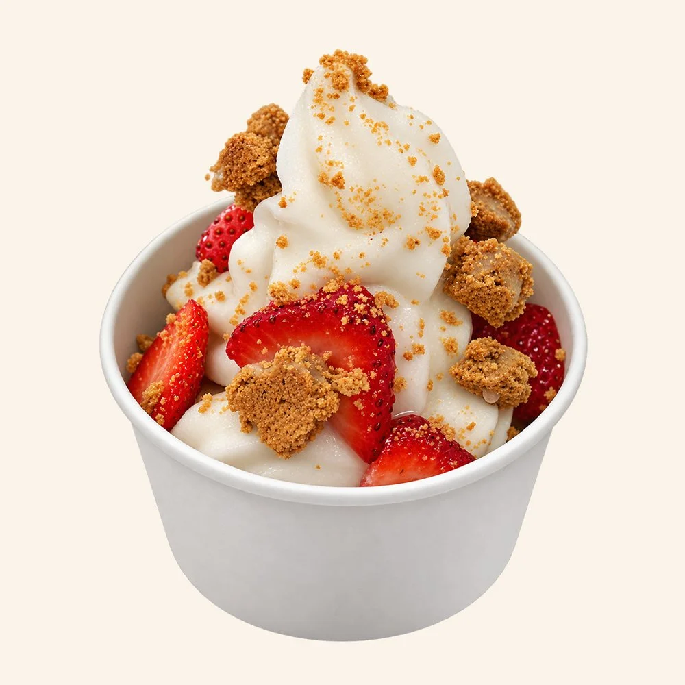 STRAWBERRY CHEESCAKE - Maple cinnamon organic soft serve, strawberry, housemade graham cracker, topped with a vanilla glaze. 