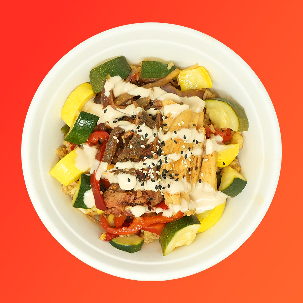 Steak & Chicken - Marinated grass-fed steak,
all natural chicken, stir-fry vegetables, sesame seeds, served over hibachi rice with a ‘yum-yum’ drizzle.