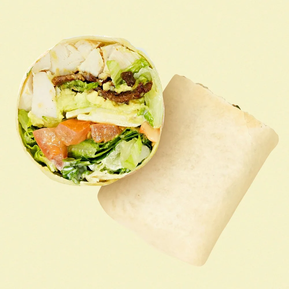Chicken BLT - All natural chicken, candied bacon, pepperjack cheese, romaine, tomato, avocado and ranch dressing in a flour wrap. Contains Gluten