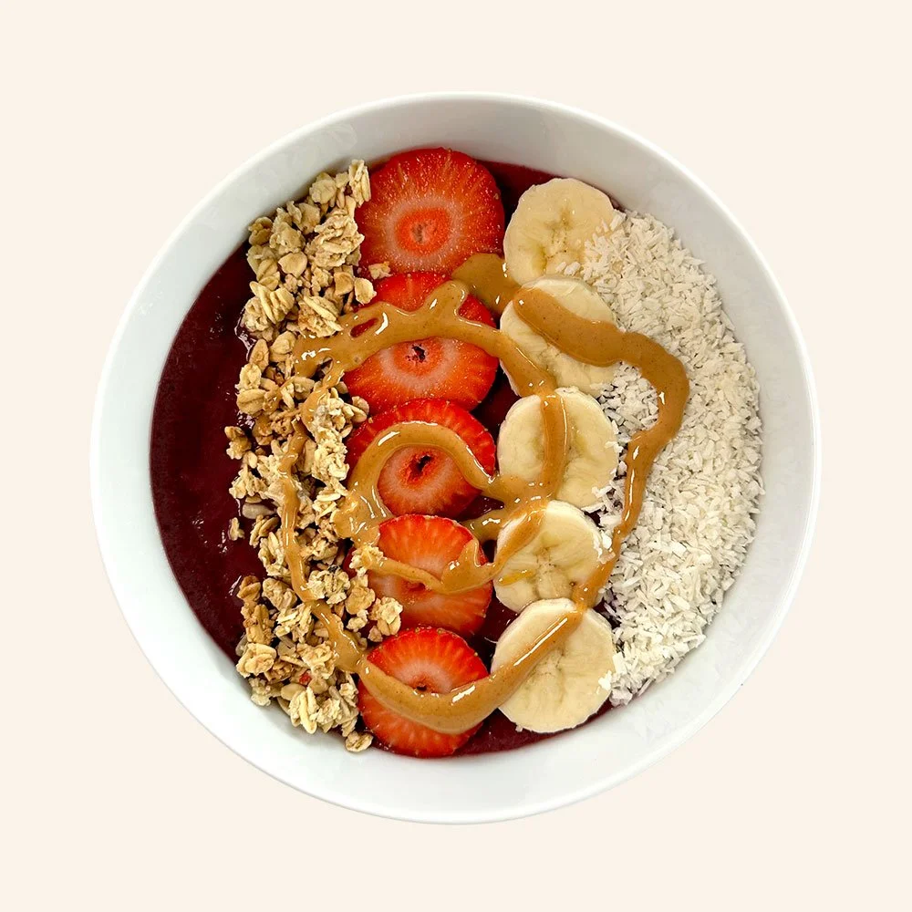 THE ACAI - Organic acai, vegan and organic granola, coconut, strawberry, banana, almond butter drizzle.