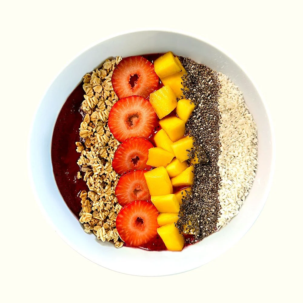 Tropical Sunrise - Organic acai, vegan and organic granola, strawberry, mango, coconut and chia seeds.