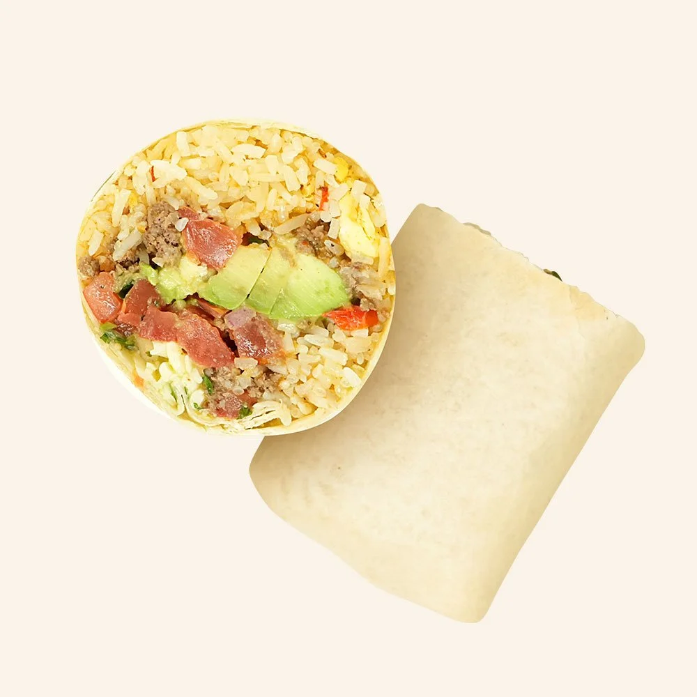 MEXICALI BURRITO - Grass-fed ground beef, rice, bell peppers, onion, scrambled eggs, cheese blend, salsa verde, avocado & housemade pico de gallo in a flour wrap. Contains Gluten