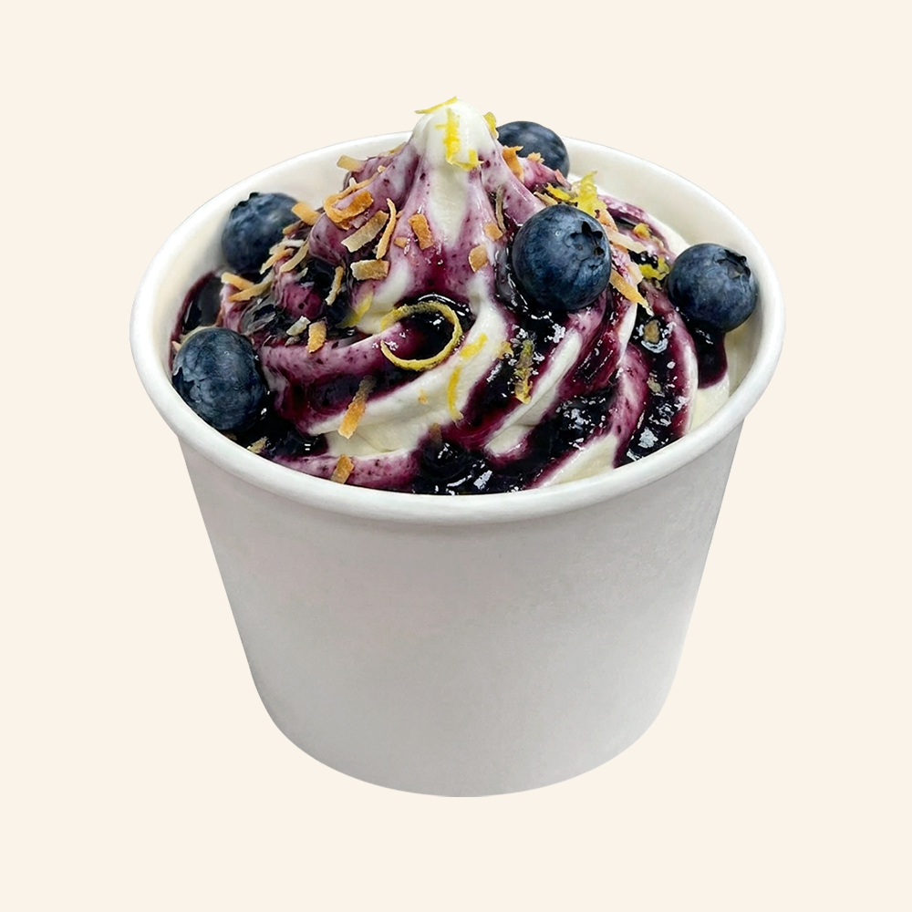BLUEBERRY MAQUI - Superfood soft serve made with organic coconut and vanilla bean, blueberry maqui glaze, fresh blueberries, toasted coconut and a lemon zest.
