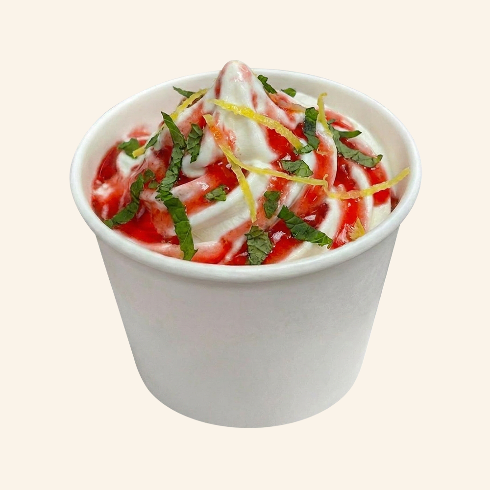 STRAWBERRY MINT PITAYA - Superfood soft serve made with organic coconut and vanilla bean, strawberry pitaya glaze, fresh mint
and a lemon zest. 