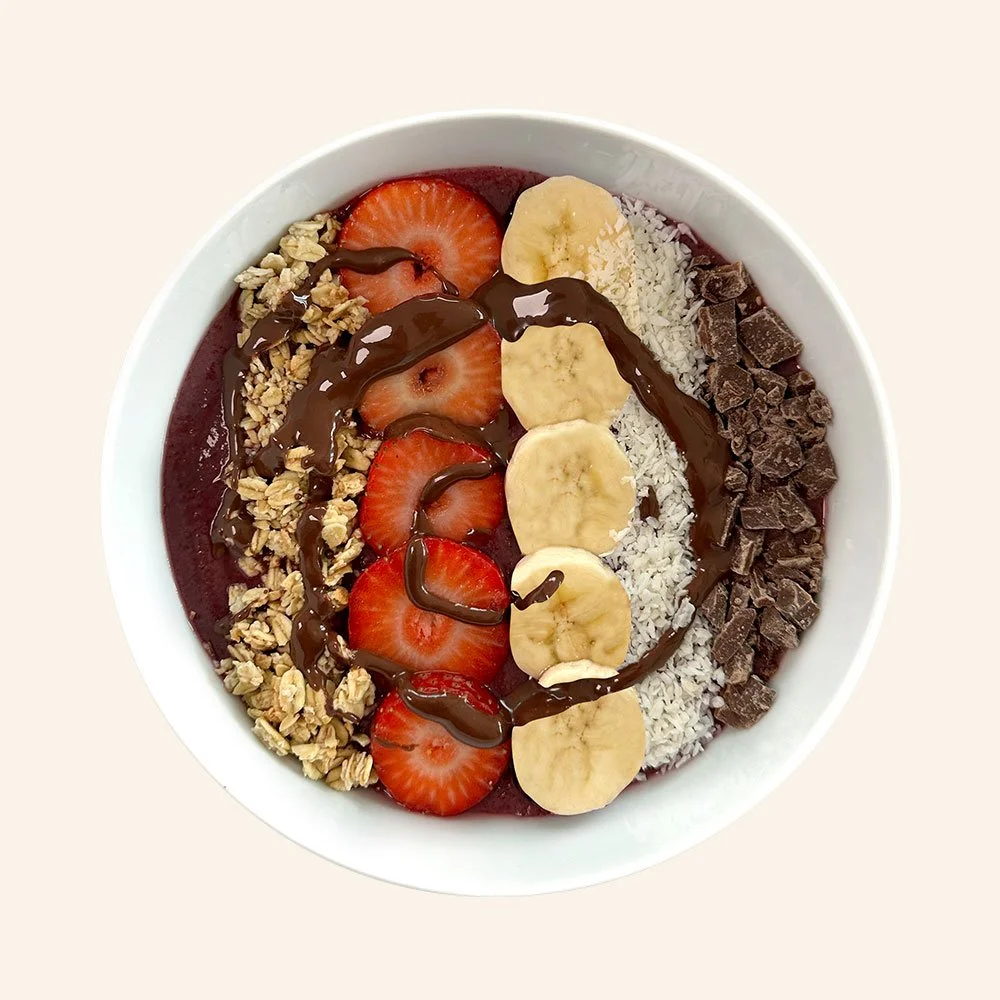 CHOCOLATE SUNSET - Organic acai, vegan and organic granola, cacao nibs, strawberries, banana, coconut, nutella drizzle.