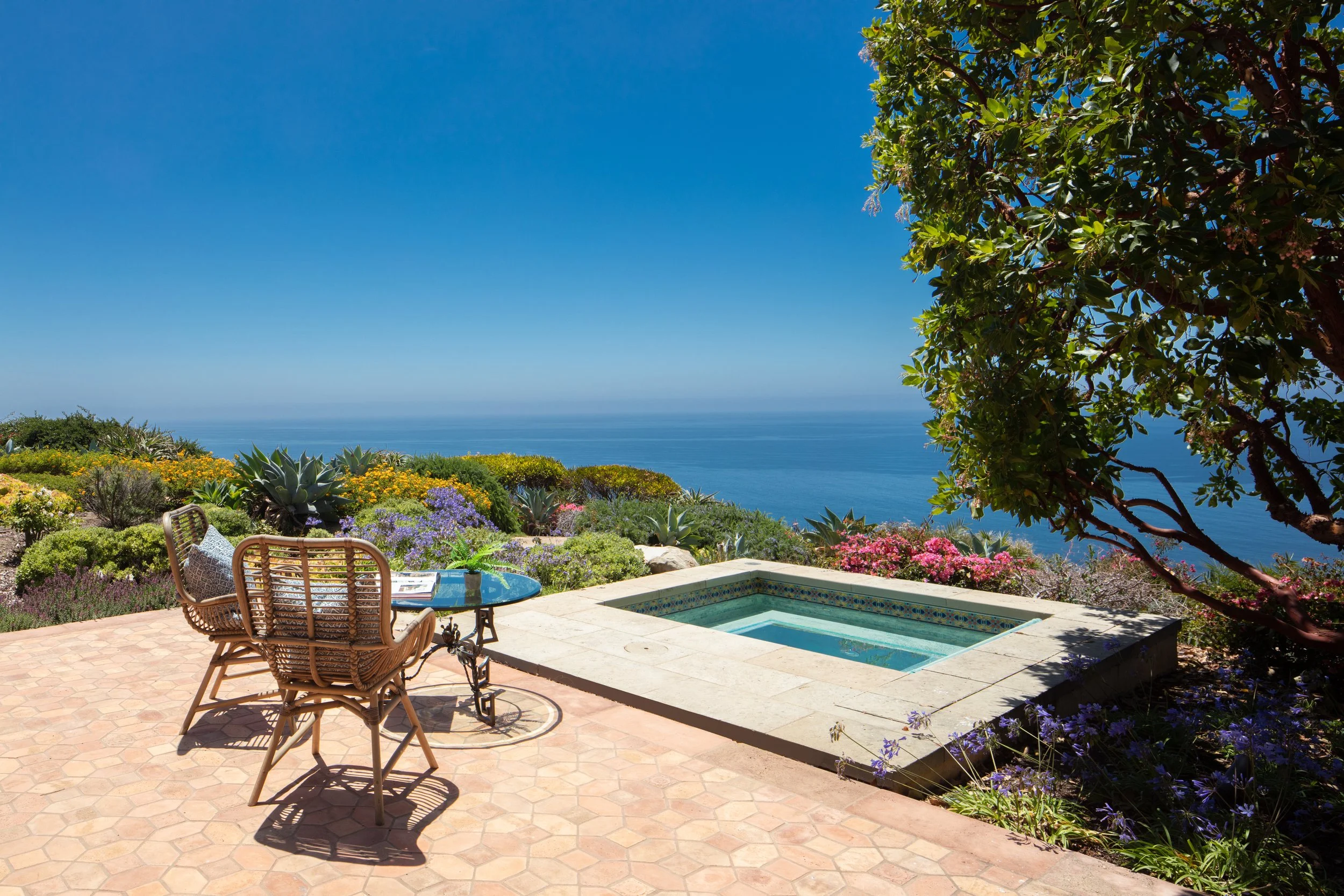 18. Primary suite Spa + patio.jpg
