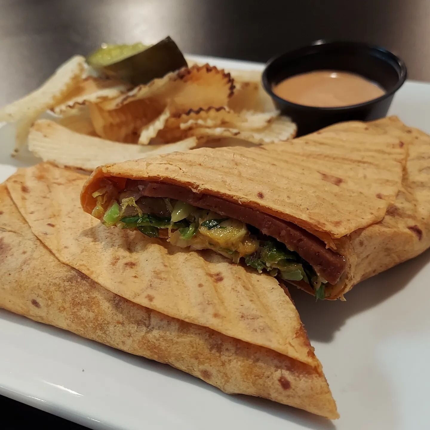 We are doing a special vegan wrap this week! The Spicey Tiefling. Susie's Seitan, Brussels sprouts, vegan cheddar and onions with a spicey veganaise dip!

#ithaca #ithacany #vegan #veganithaca #food #specials #foodspecialithaca #gamebar