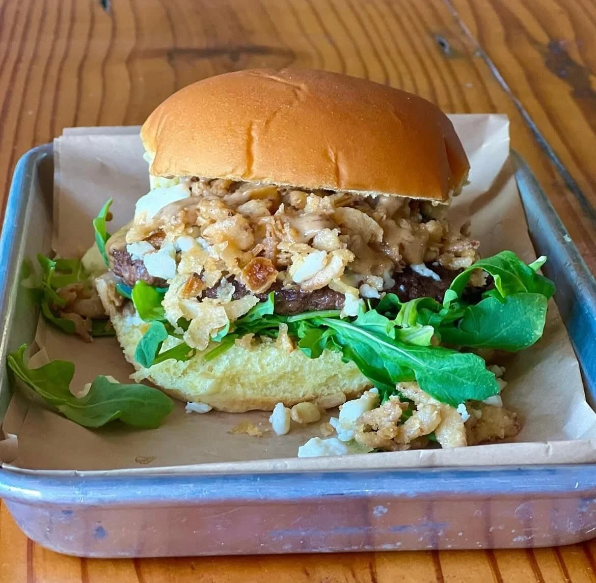 Last week for our Burger of the month: 
&ldquo;Black &amp; Blue&rdquo;  Beef patty, black garlic aioli, blue cheese, crispy fried onions and arugula on a potato bun