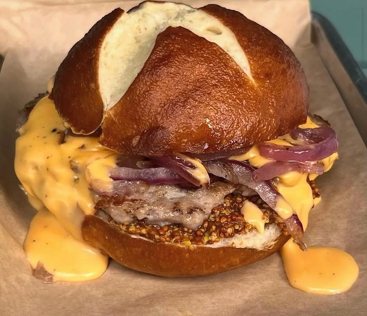 Last week to get our burger of the month &ldquo;Oktoberfest Burger&rdquo;  Bratwurst seasoned pork patty with wholegrain mustard, caramelized onions topped with beer cheese on a pretzel bun.