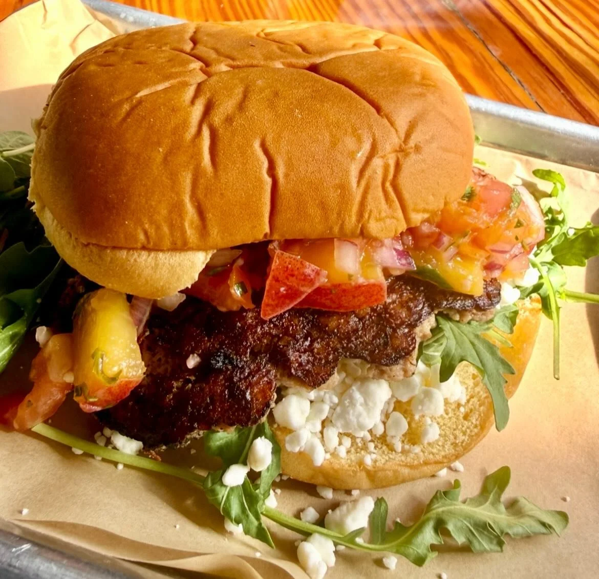 June special:
&ldquo;Hot Peach Gobbler&rdquo;
Peach Habanero salsa, arugula, goat cheese, turkey patty on a potato bun