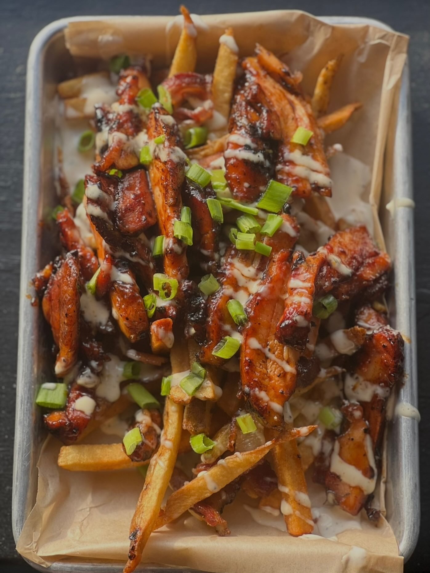 New special!
 &ldquo;Clucked and Loaded&rdquo;
 In-house smoked chicken tossed in BBQ sauce and bacon over hand cut fries topped with ranch and green onions