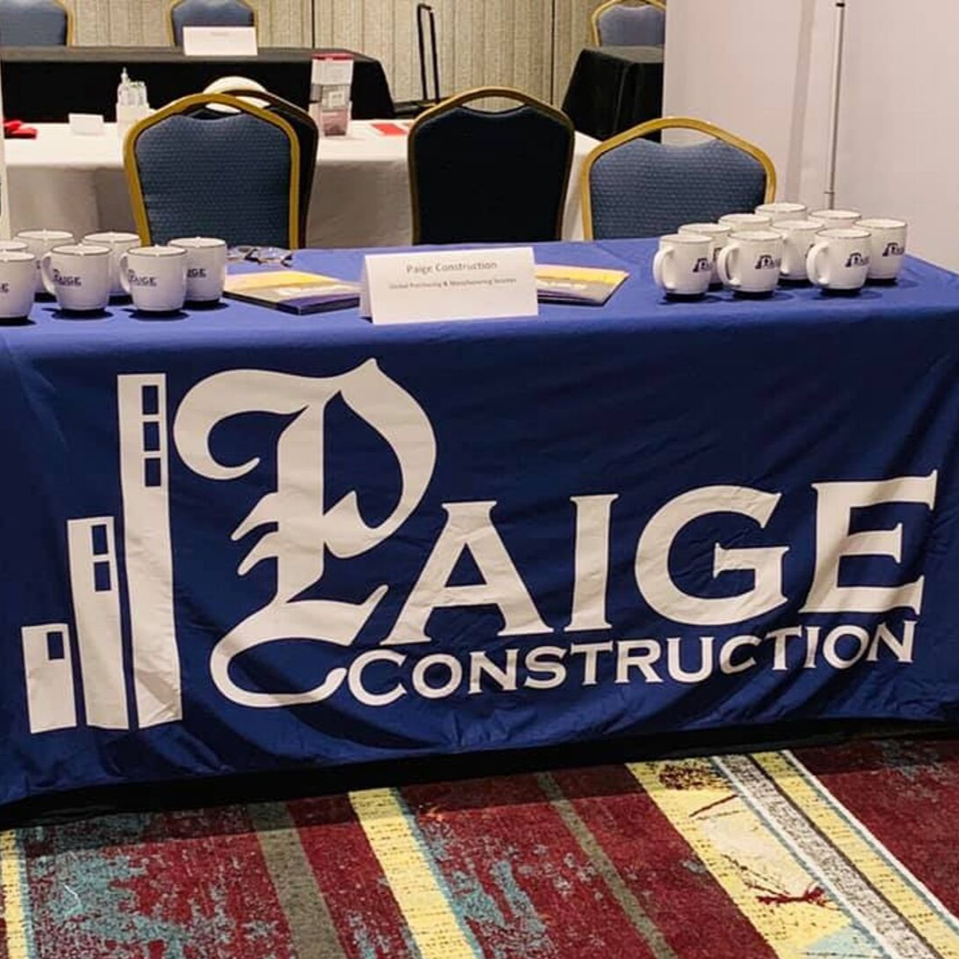 Pige Construction Tradeshow Table.png