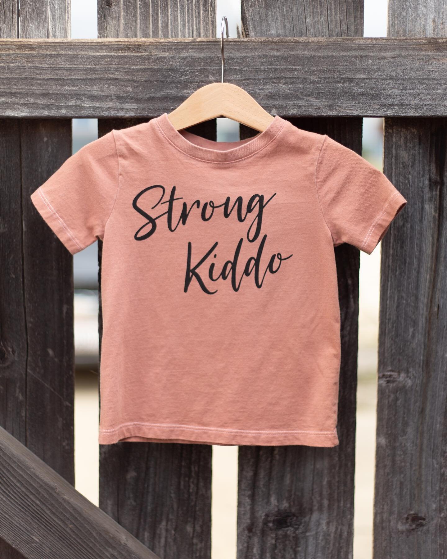 Naturally Hand-Dyed Strong Kiddo Tee! 
100% Organic Cotton 
Dyed by Megan with Quebracho Rojo (Hardwood from a tree found in Argentina) 
Only 3 left in stock!