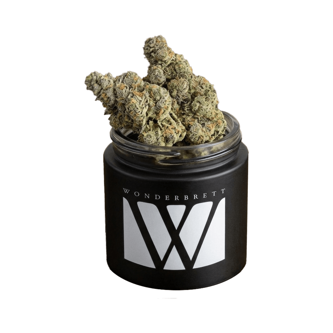 Wonderbrett premium cannabis flower in a black branded glass jar, featuring dense trichome-covered buds with orange pistils. Small-batch California craft flower grown by Wonderbrett.
