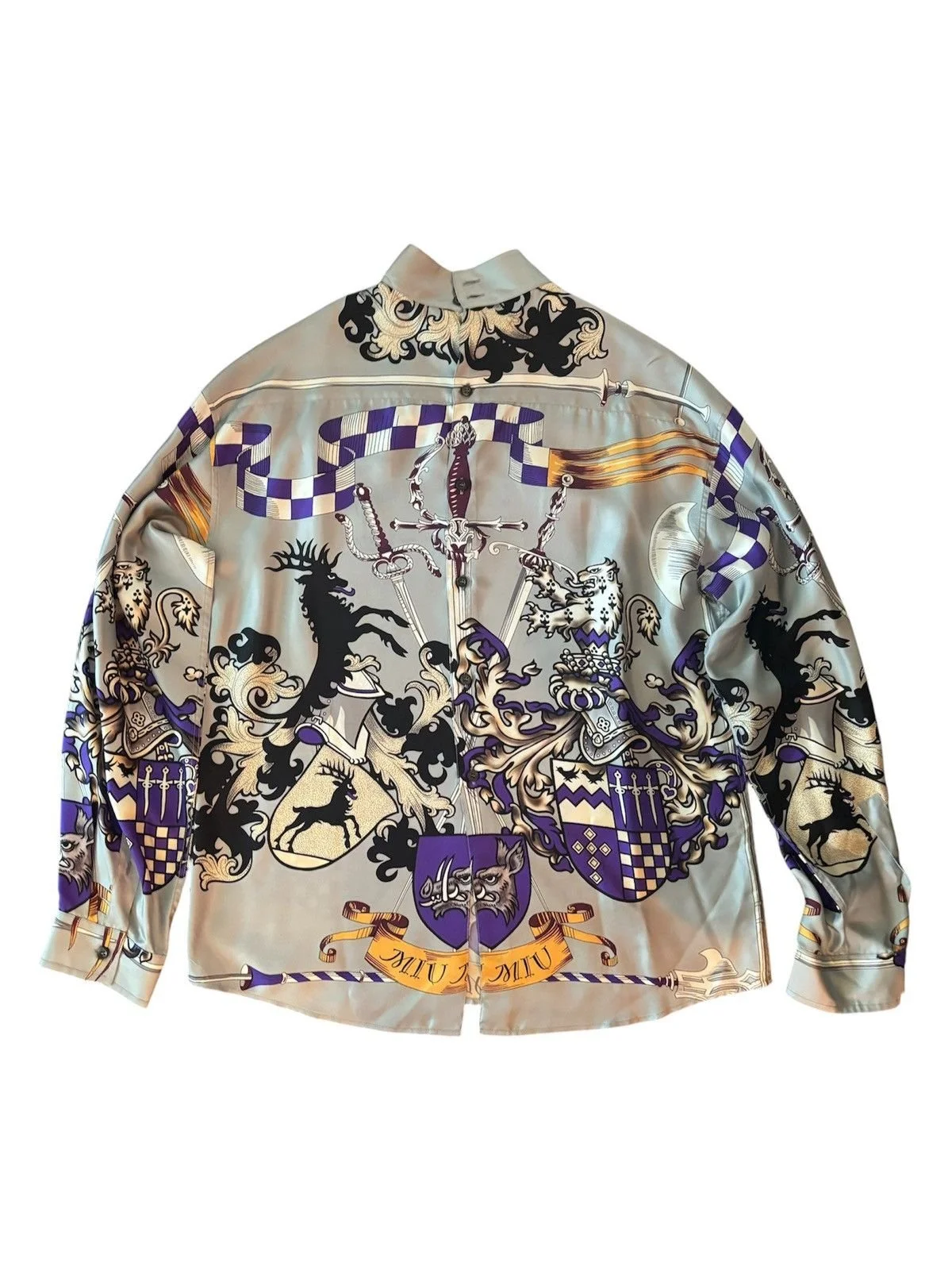 Miu Miu    2018 — Released as part of their reedition campaign; originally released in 2006 Coat of Arms Button-Up  Size 42
